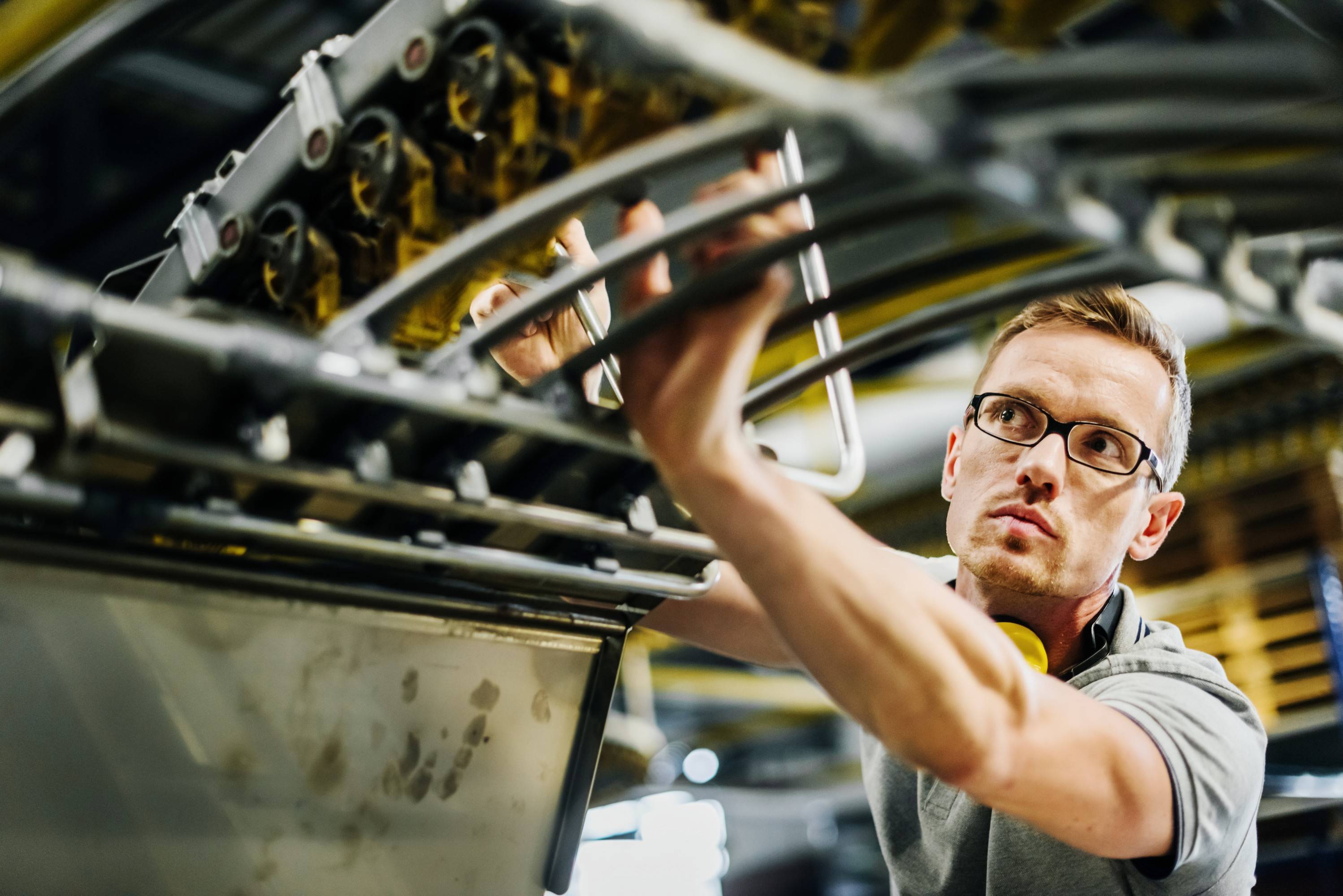 Operations maintenance. Logistics Parts. Man and Machine. Power Machines stock photos.